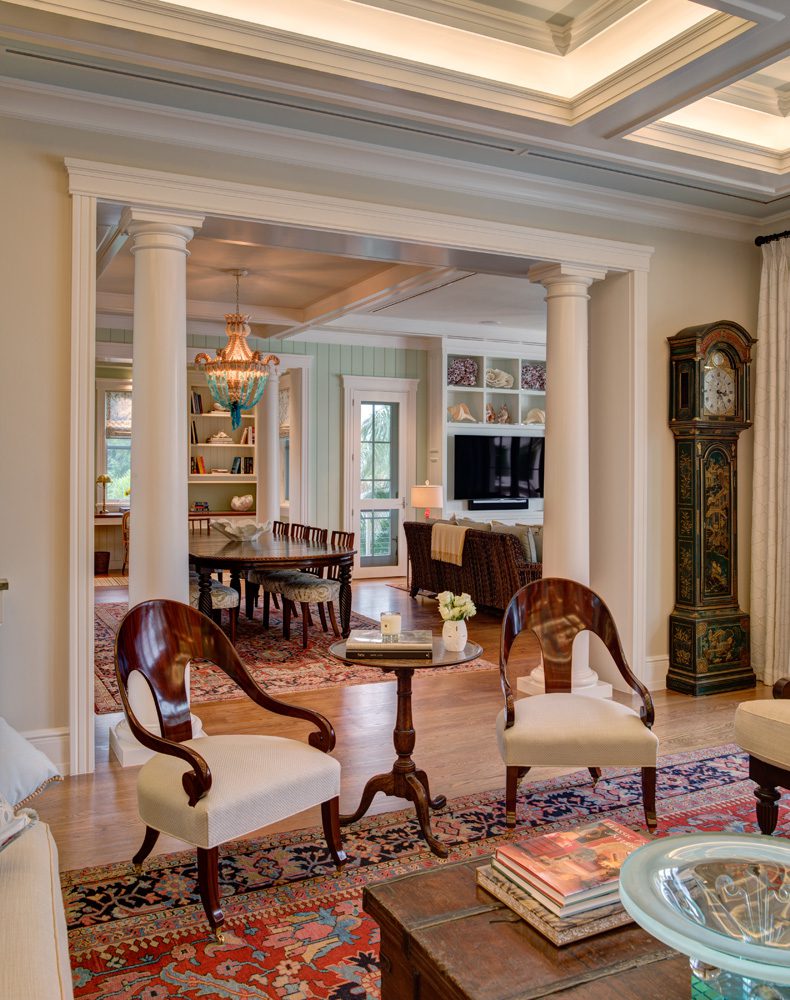 A living room with two chairs and a table